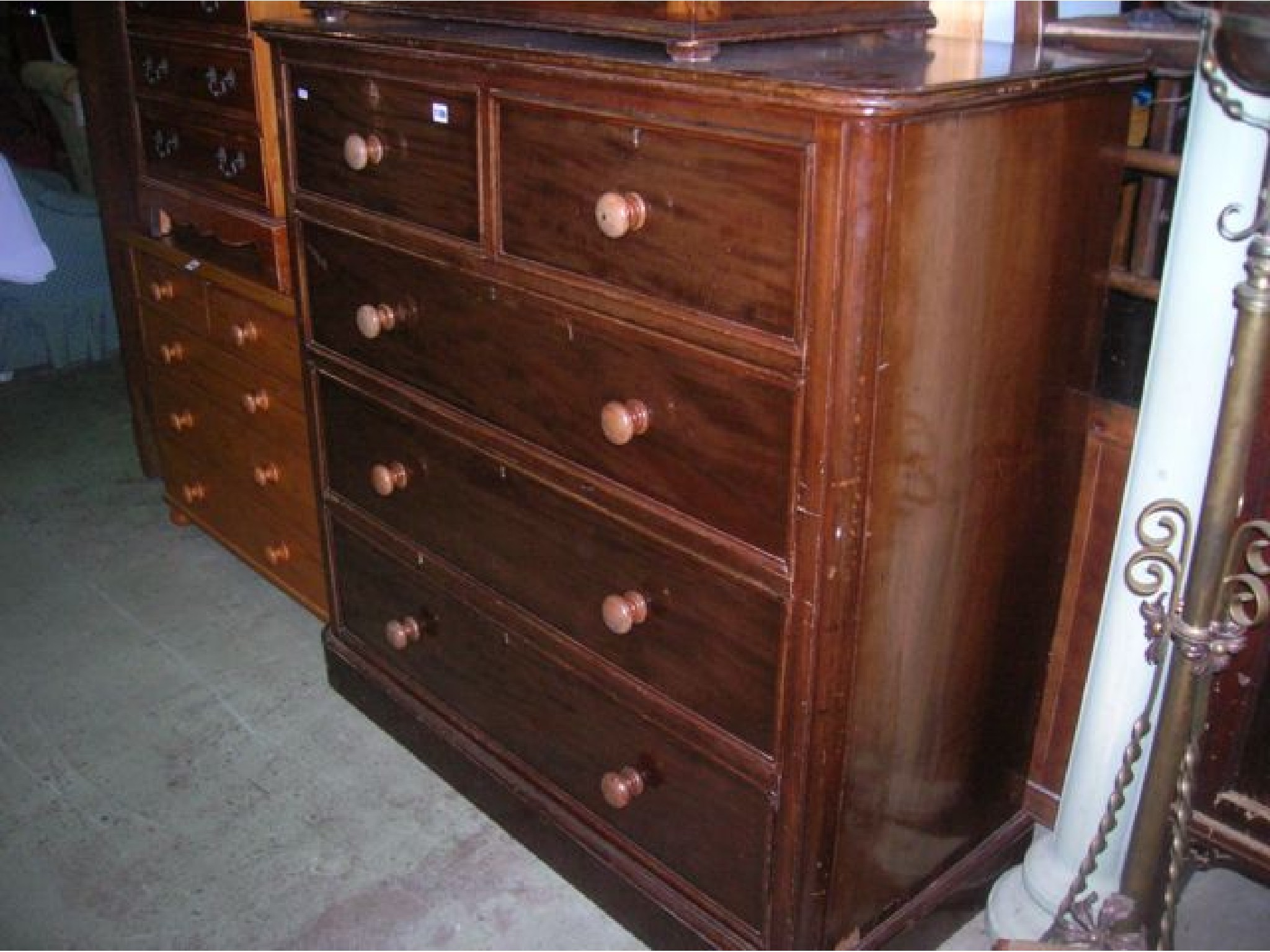 Appraisal: A substantial Victorian mahogany bedroom chest of three long and