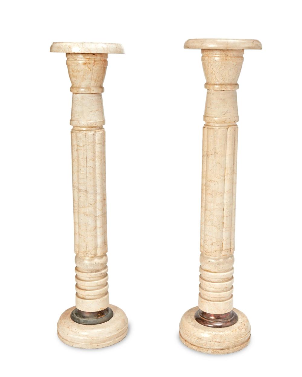 Appraisal: A pair of marble pedestals th Century Each in cream-colored