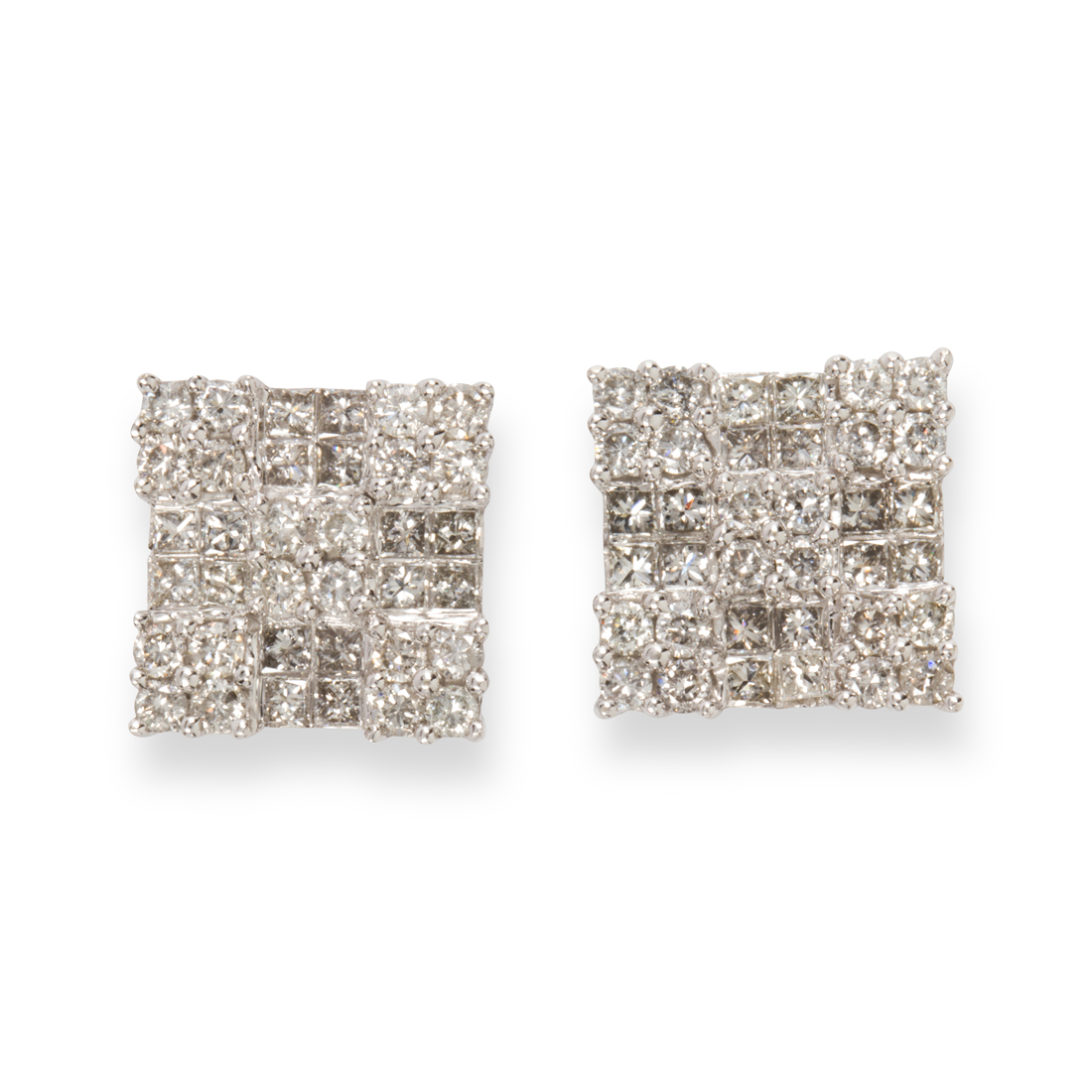 Appraisal: A PAIR OF DIAMOND AND FOURTEEN KARAT WHITE GOLD EARRINGS