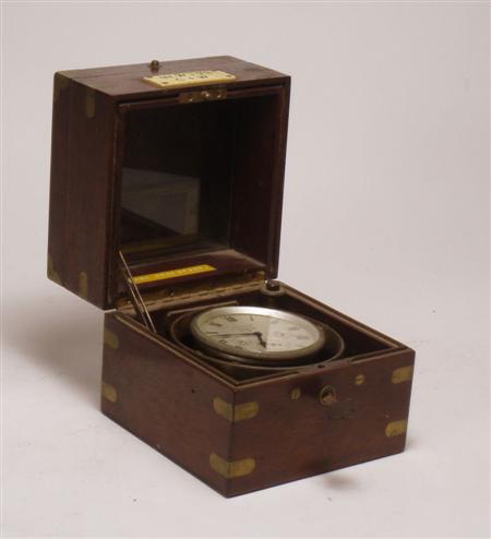 Appraisal: A small th century mahogany cased marine chronometer By Waltham