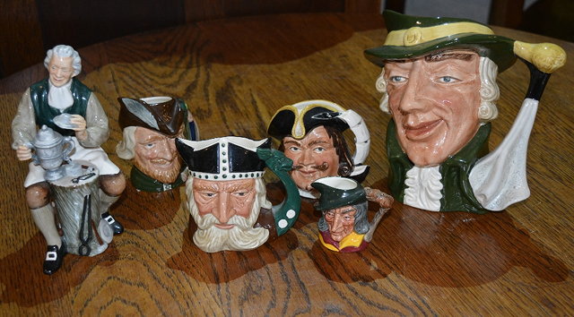 Appraisal: A Royal Doulton model 'The Tinsmith'HN and five Royal Doulton