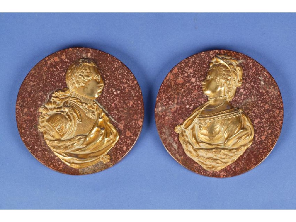 Appraisal: A PAIR OF GEORGE III GILT METAL PORTRAIT PLAQUES of