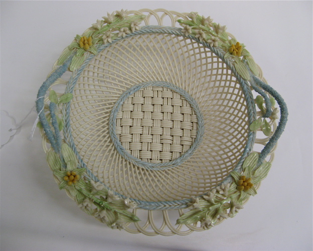 Appraisal: IRISH BELLEEK ROUND FOUR STRAND LILY BASKET having painted flowers