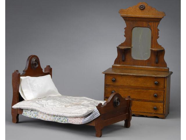 Appraisal: Victorian Doll-Size Bed and Dresser America late th century Walnut