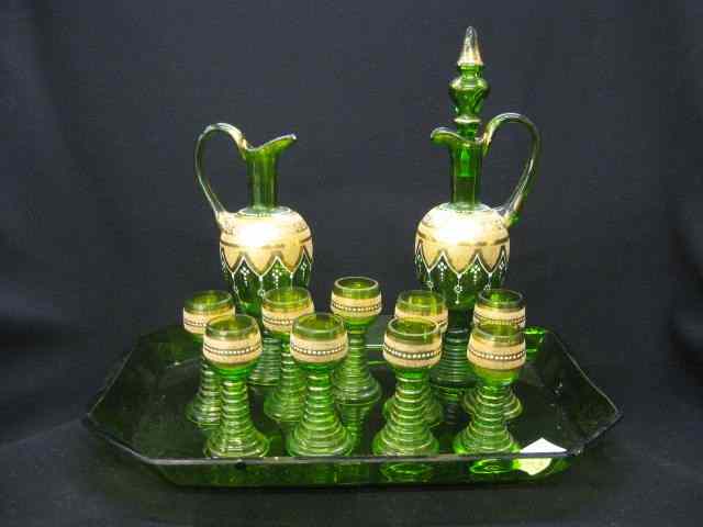 Appraisal: Emerald Art Glass Decanter Cordial Set matching tray fancy goldwork