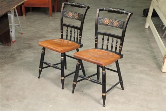 Appraisal: TWO HITCHCOCK CHAIRS Both with floral stencil decoration black paint