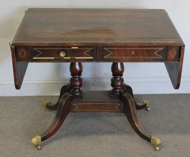 Appraisal: Regency Style Rosewood Drawer Sofa Tablewith Brass Inlay From a