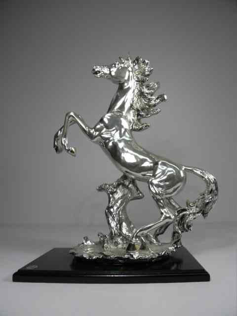 Appraisal: Italian sterling silver clad resin sculpture of a horse mounted