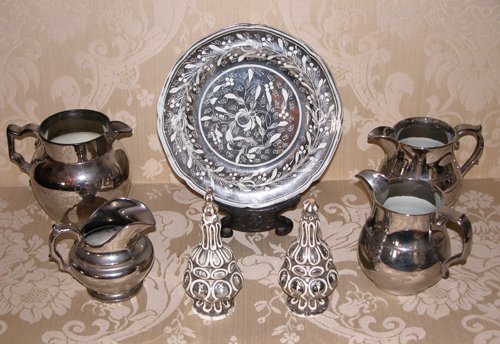 Appraisal: Title Assorted Silver Resist Ware with four pitchers floral decorated