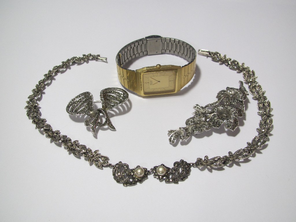 Appraisal: A marcasite and paste pearl necklace two marcasite brooches and