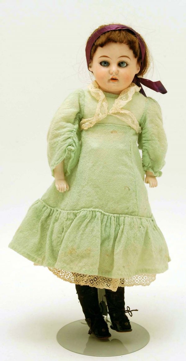 Appraisal: A German bisque shoulder head child doll Marked to back