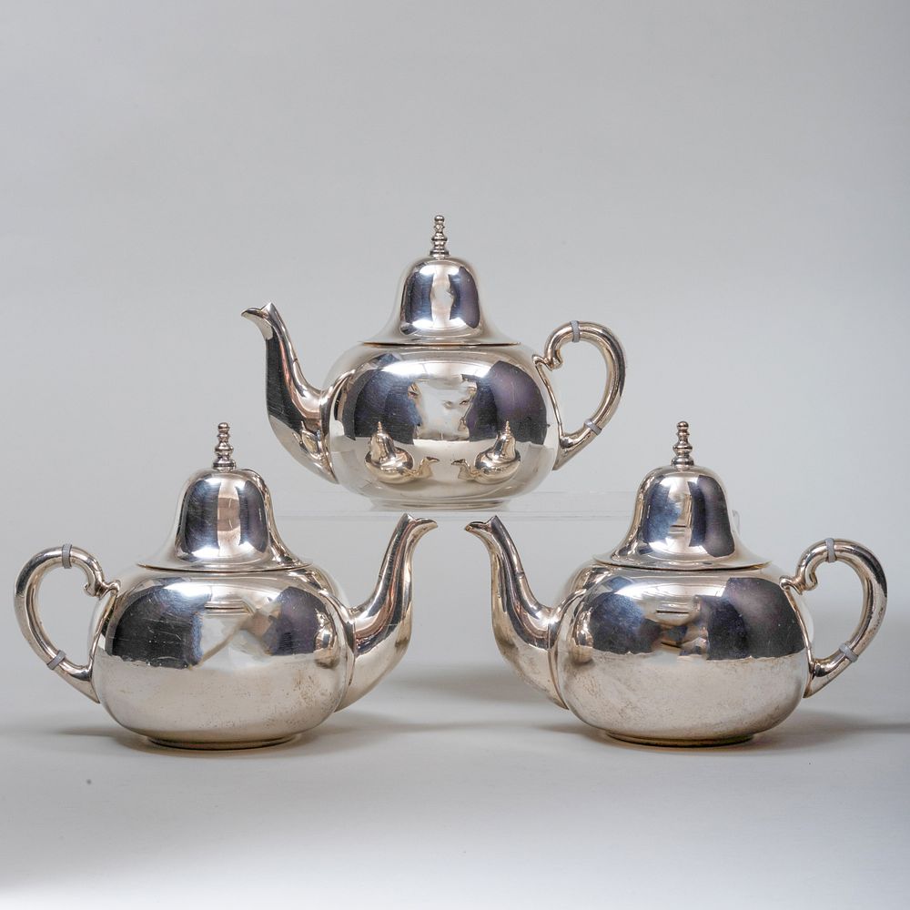 Appraisal: Three Mexican Taxco Silver Teapots Marked 'Sterling' with composite insulators