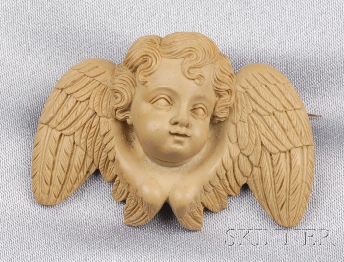 Appraisal: Antique Lava Cameo Brooch depicting a flowing-haired cherub with finely