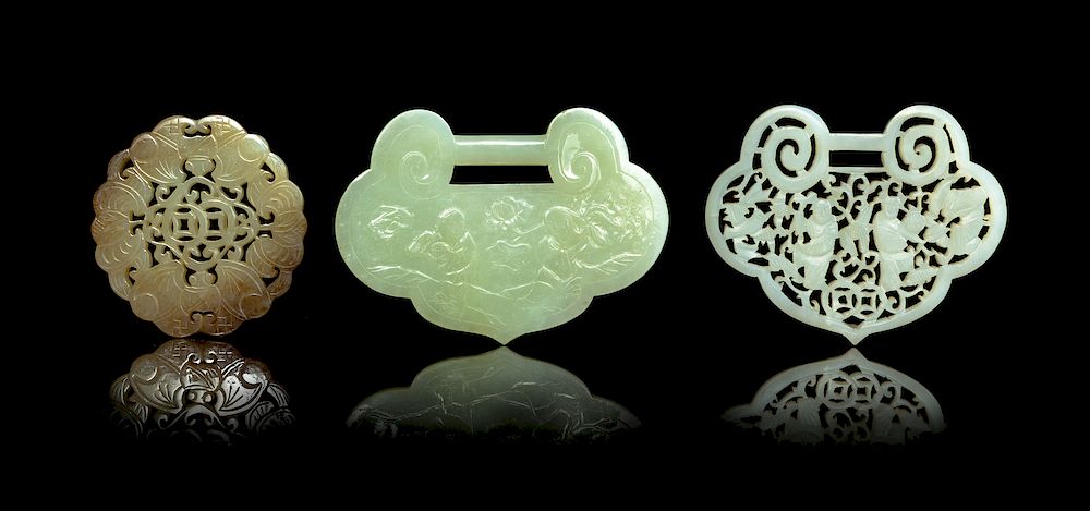 Appraisal: Three Jade Pendants Largest length in cm Three Jade Pendants