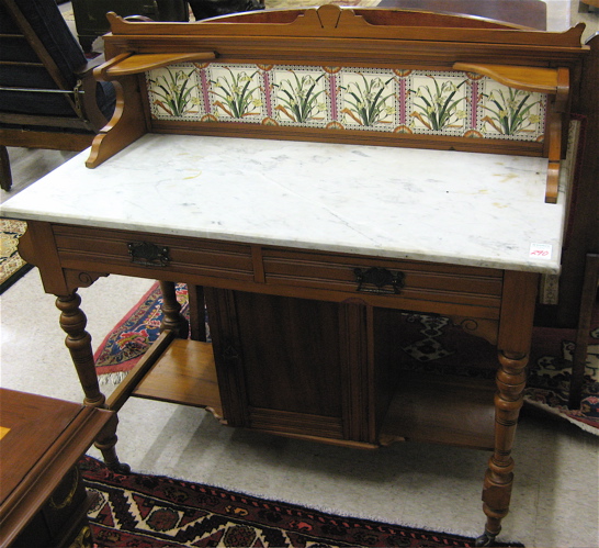 Appraisal: VICTORIAN MARBLE-TOP WASHSTAND English late th century having a tile