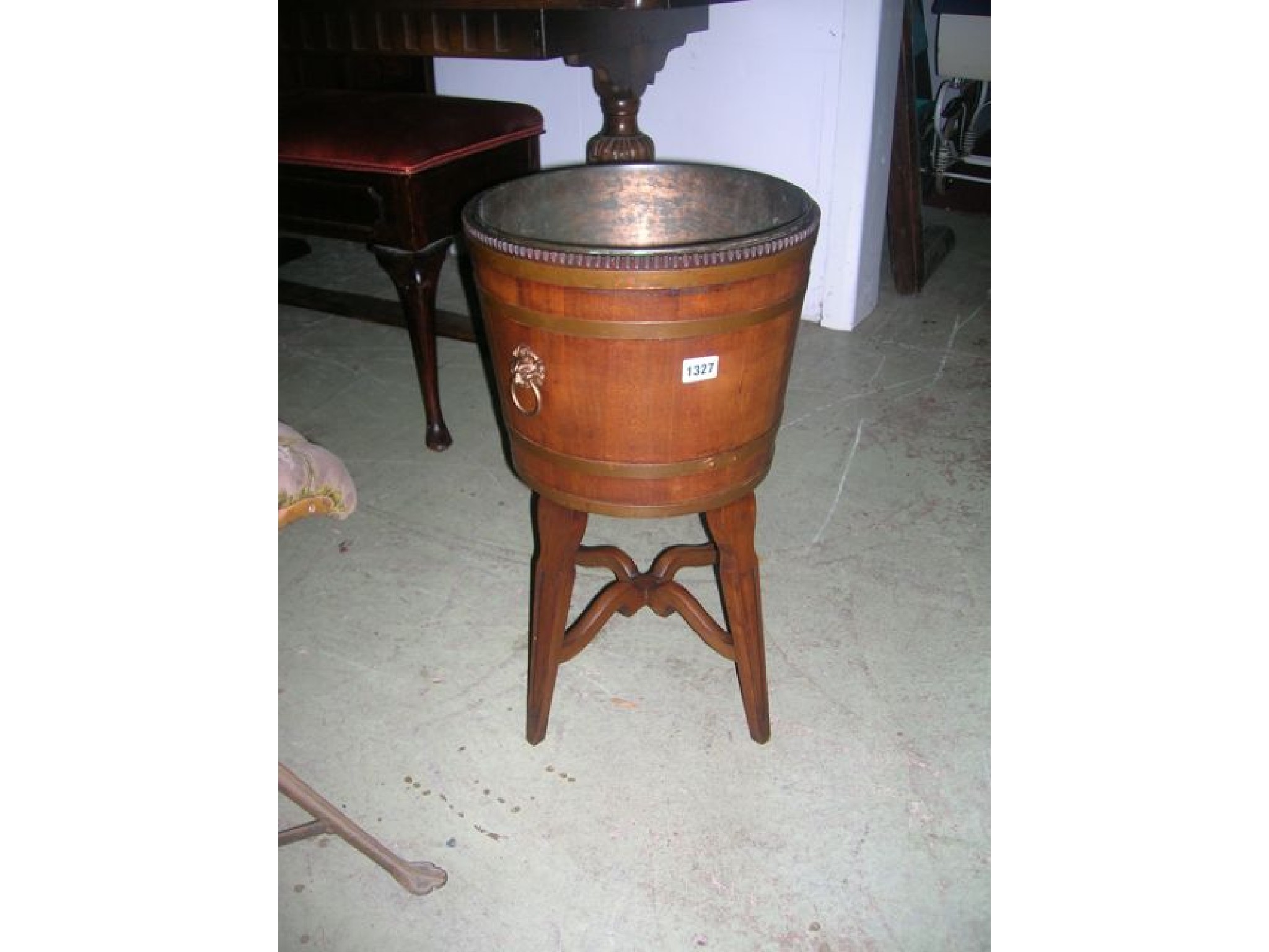 Appraisal: A good quality Edwardian coopered mahogany and brass banded jardiniere