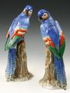 Appraisal: PAIR PORCELAIN FIGURINES - Blue Macaws on Tree Stumps mirrored