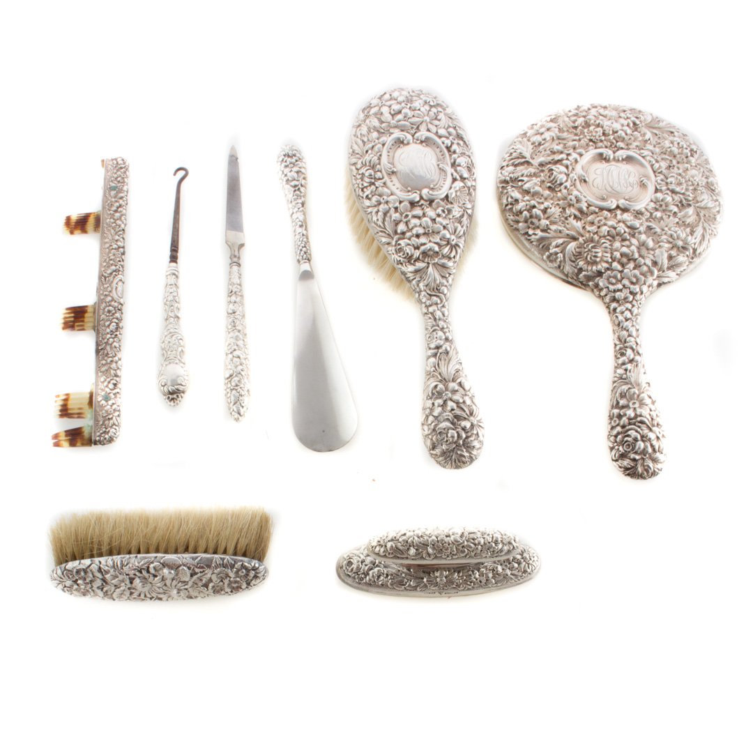 Appraisal: Kirk Stieff repousse sterling -piece vanity set comprising mirror hair