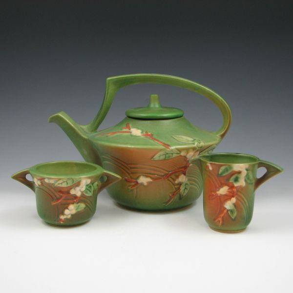 Appraisal: Three-piece Roseville green Snowberry tea set including creamer sugar and