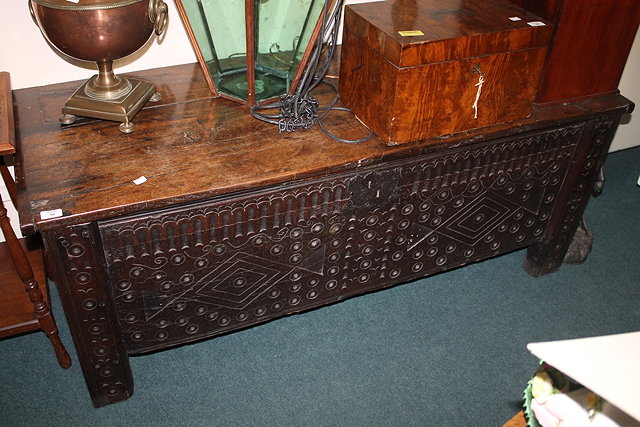 Appraisal: A LARGE TH CENTURY OAK COFFER with carved panel front