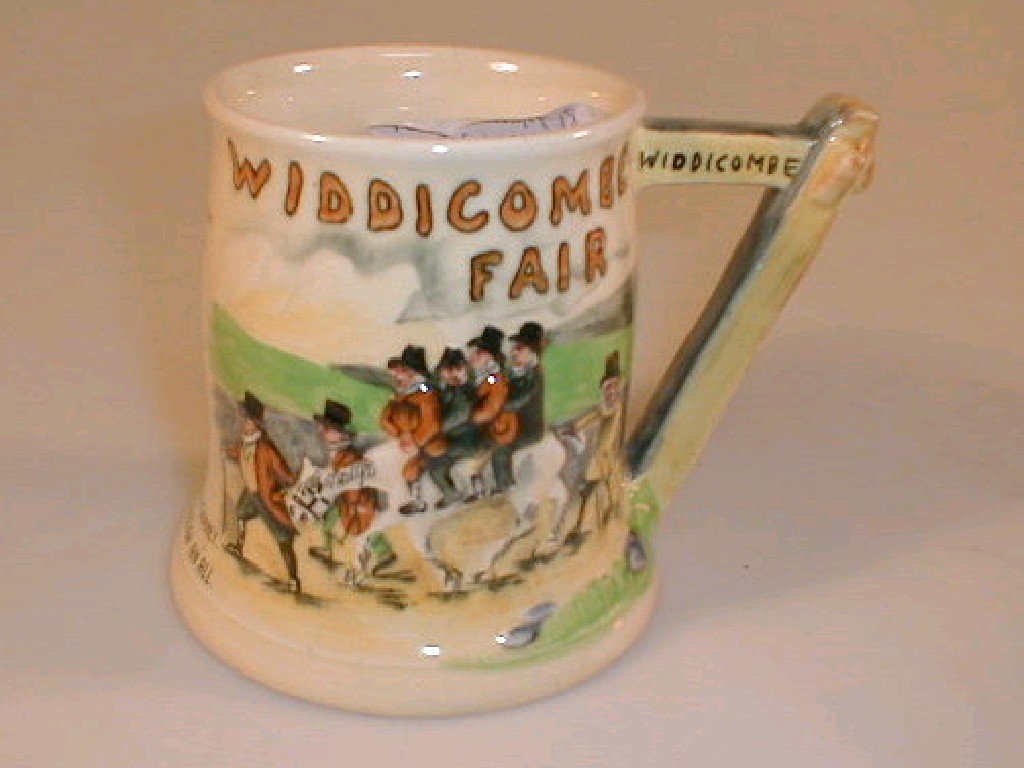 Appraisal: A Crown Devon Widdecombe Fair pottery musical mug