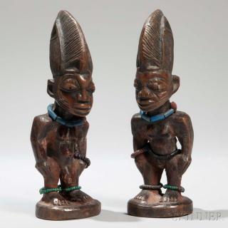 Appraisal: Pair of Yoruba Ibeji Dolls male and female both wearing