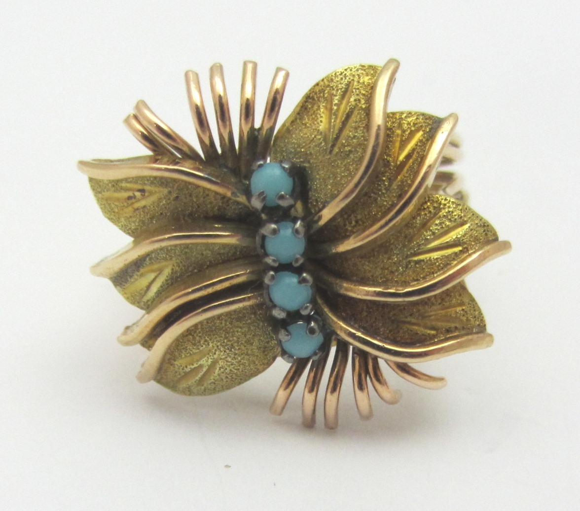 Appraisal: A gold and pale blue gem set ring in a