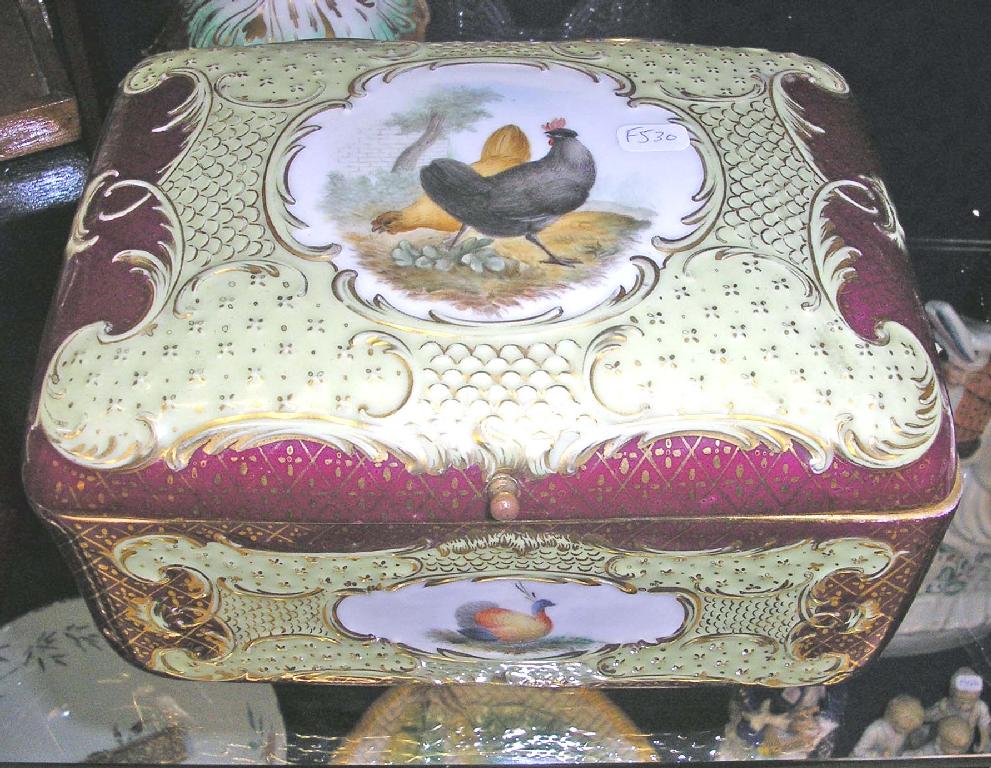 Appraisal: A Vienna porcelain dressing table box decorated with cartouches of