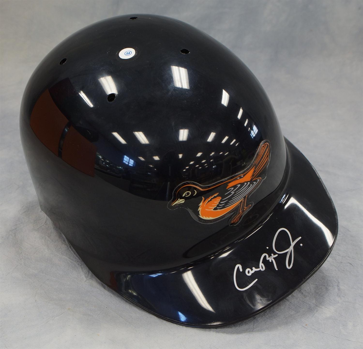 Appraisal: Cal Ripken Jr autographed Orioles black batting helmet silver ink