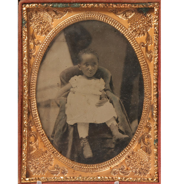 Appraisal: African American child ferrotype tintype photograph little girl in seated