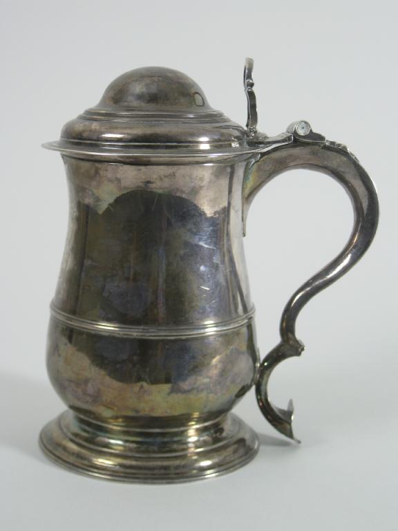 Appraisal: A George II baluster Quart Tankard engraved initials with domed