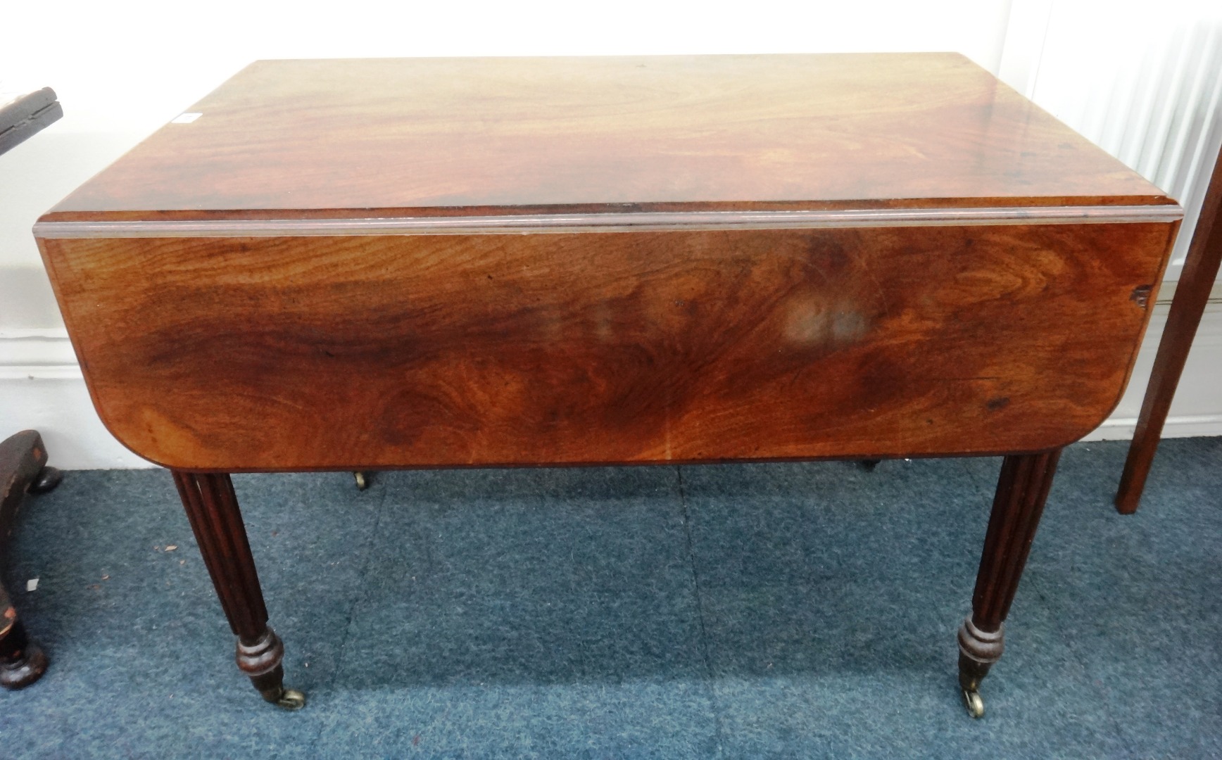 Appraisal: A William IV mahogany Pembroke table with end drawer on