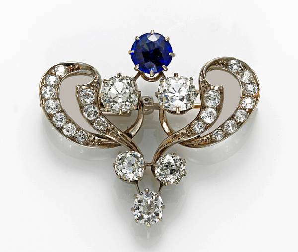 Appraisal: An antique diamond and blue stone brooch principal diamonds weighing