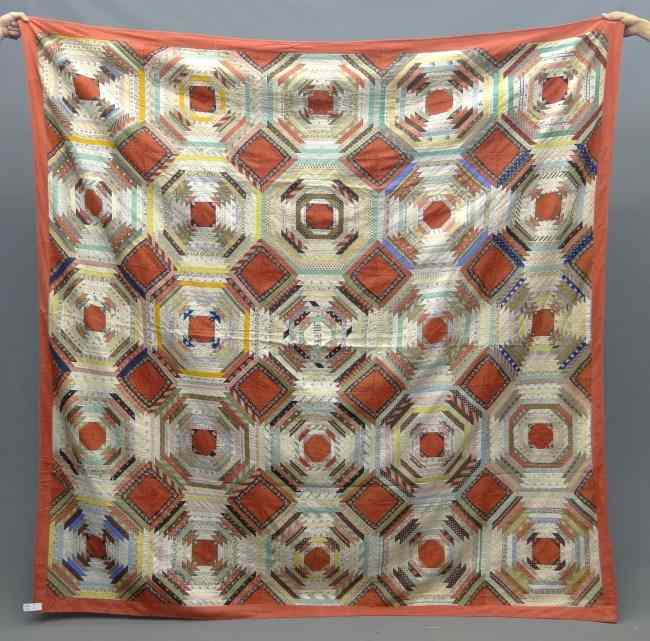 Appraisal: th c Pineapple Log Cabin quilt One patch initialed ''MJR''