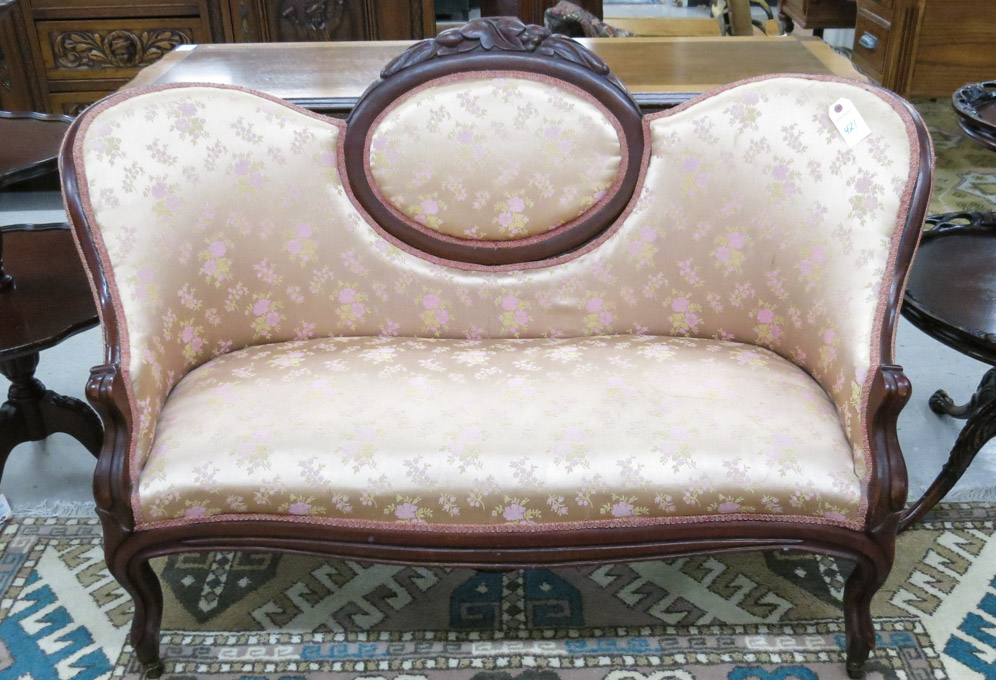 Appraisal: VICTORIAN STYLE MEDALLION-BACK SETTEE American early th century having a