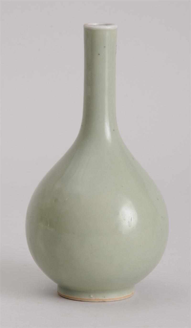 Appraisal: CHINESE GREEN-GLAZED BOTTLE VASE The footed bowl unadorned Provenance Christie's