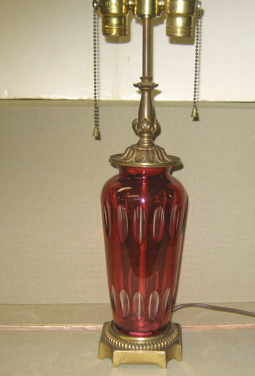 Appraisal: CRANBERRY OVERLAY GLASS VASE Mounted as table lamp the body