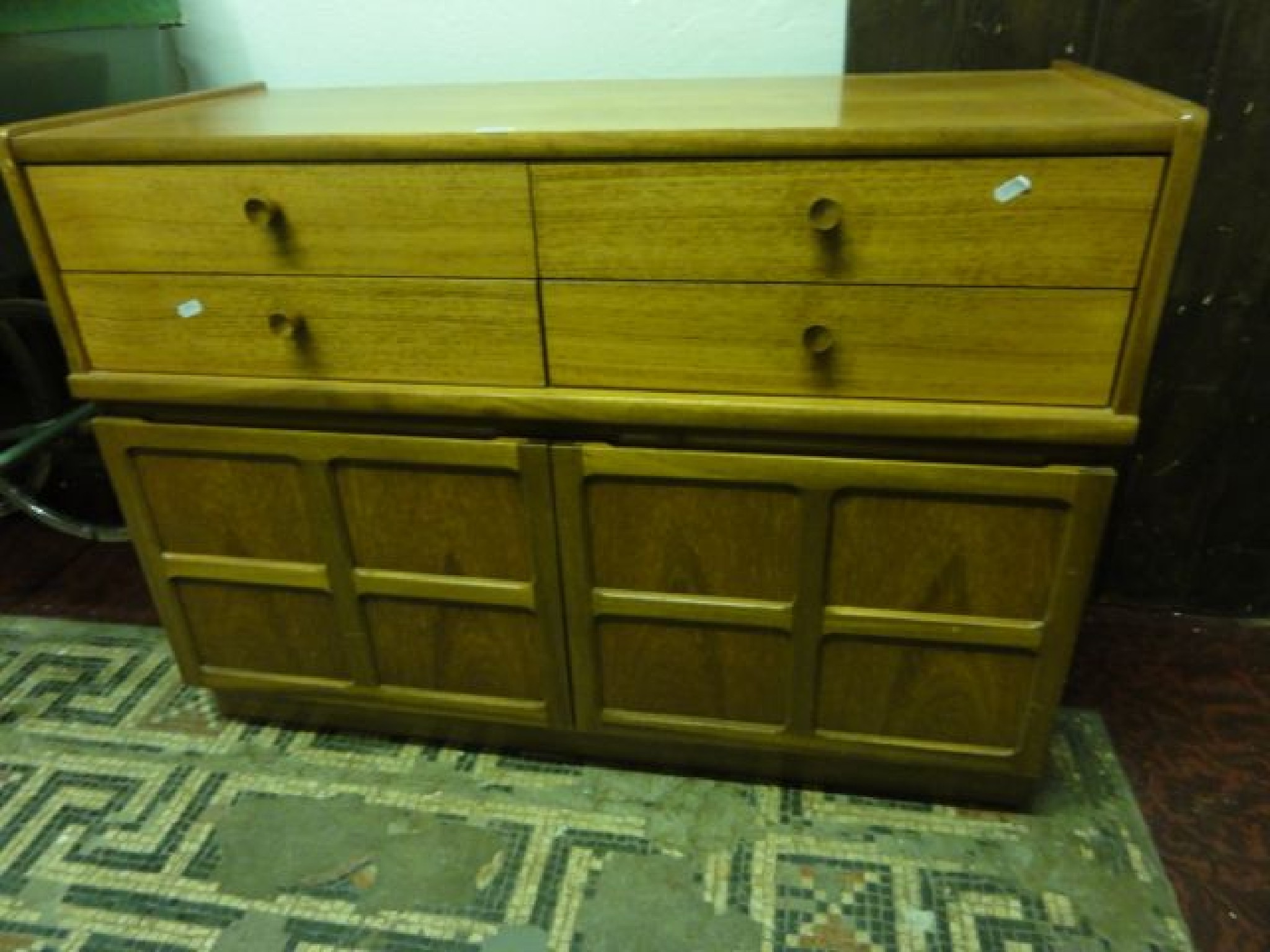 Appraisal: A mid- th century Nathan teak sideboard enclosed by a