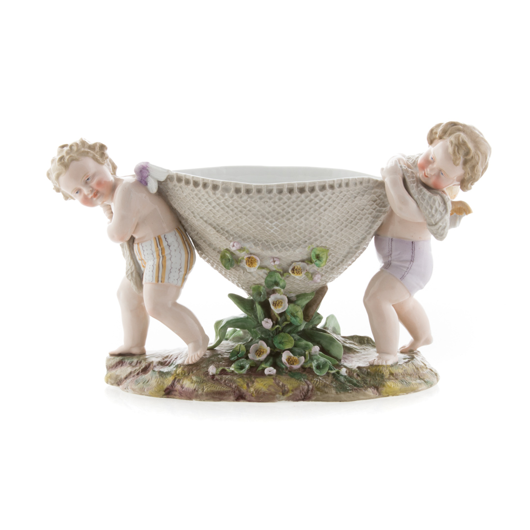 Appraisal: German porcelain figural centerpiece in the Meissen style modeled as