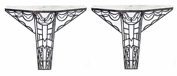 Appraisal: A pair of Art Deco wrought iron and marble topped