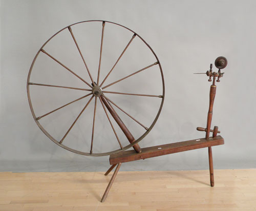 Appraisal: Large spinning wheel th c h