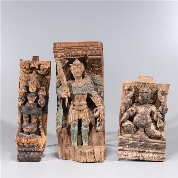 Appraisal: Group of three Indian carved wood architectural elements depicting various