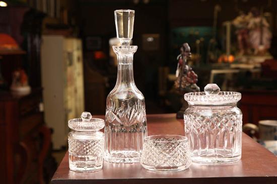 Appraisal: FOUR PIECES OF CRYSTAL All are Waterford Decanter a covered