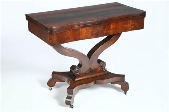 Appraisal: TILT TOP GAME TABLE Flame grain mahogany veneerd table with