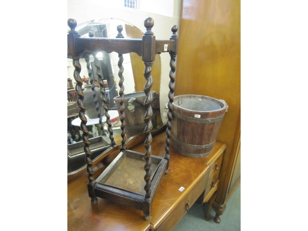 Appraisal: Oak stick stand and an oak bound bracket