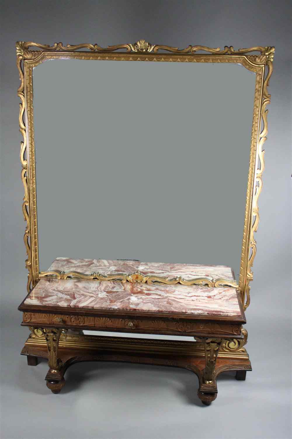 Appraisal: MONUMENTAL HALL MIRROR AND ATTACHED CONSOLE STAND having a large