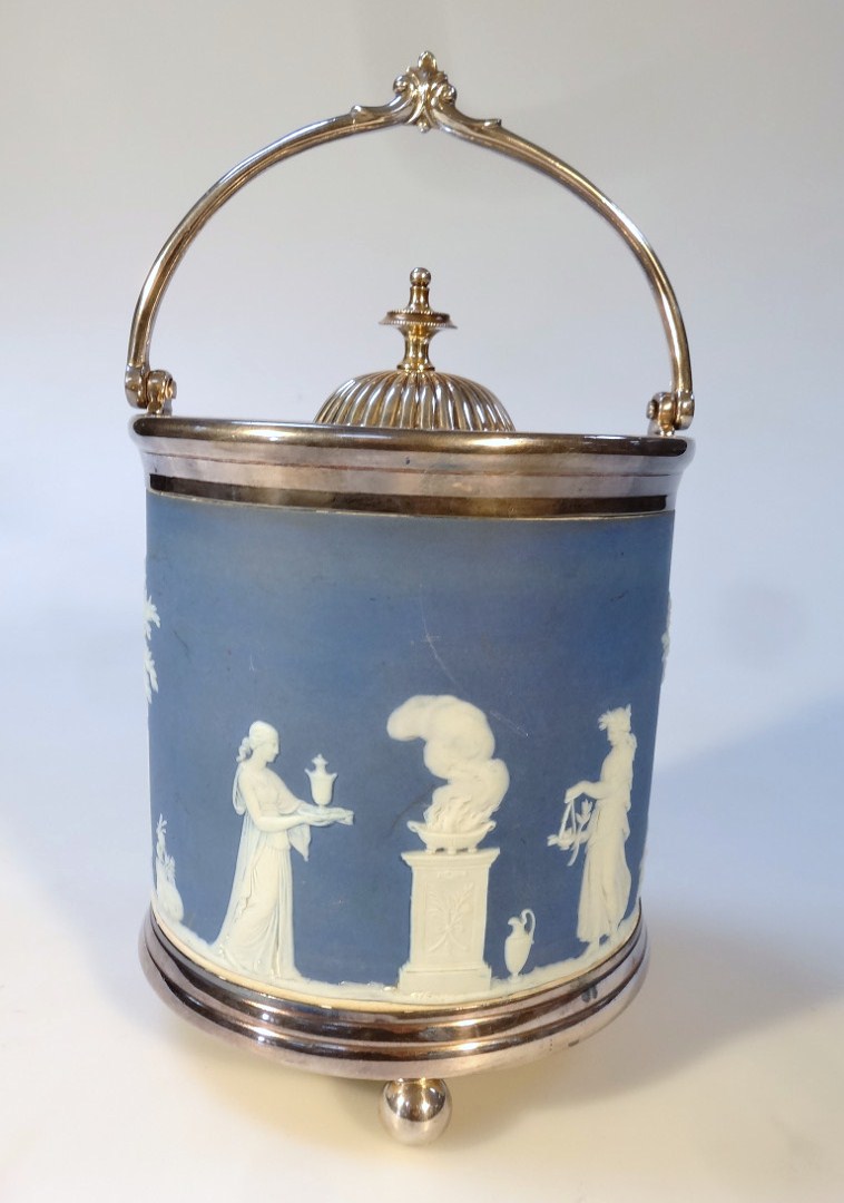 Appraisal: A Wedgwood blue Jasperware biscuit barrel the circular body raised