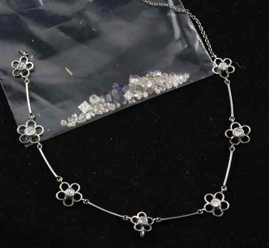 Appraisal: A white gold and diamond flowerhead link necklace in need