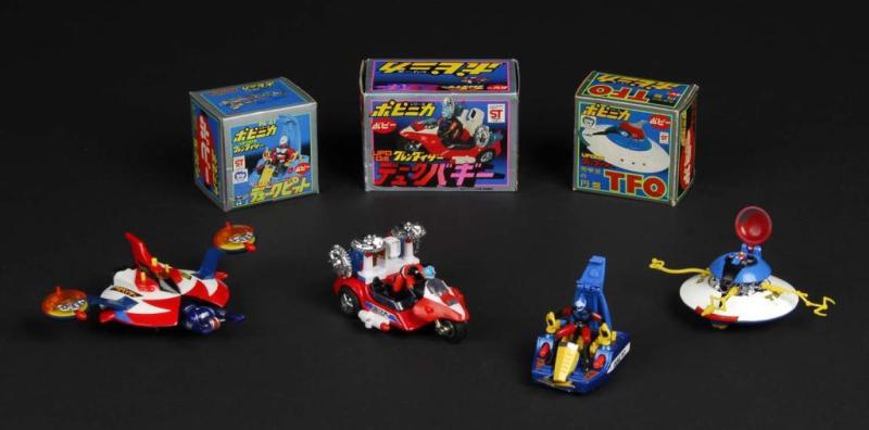 Appraisal: Lot of Popinika die-cast vehicles Description from Grandizer Japanese Made