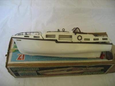 Appraisal: A Penguin Avon high speed motor cruiser plastic battery powered